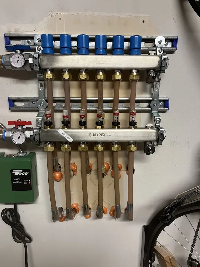 Plumber performing Water Heater Repair at a residential property in Plumsted